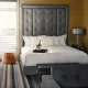 A champagne amenity on the king bed of a Luxury Suite at Hotel Arts Kensington, Calgary, AB